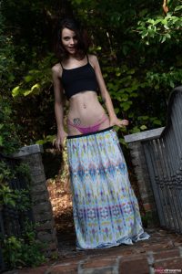 Adorable Brunette Removes Her Dress And Uncovers Peachy Ass Accentuated With Sexy Pink Undies