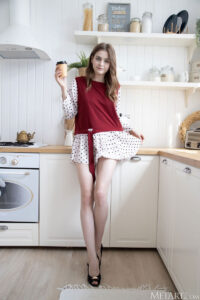 Olivia Lust posed in casual home setting